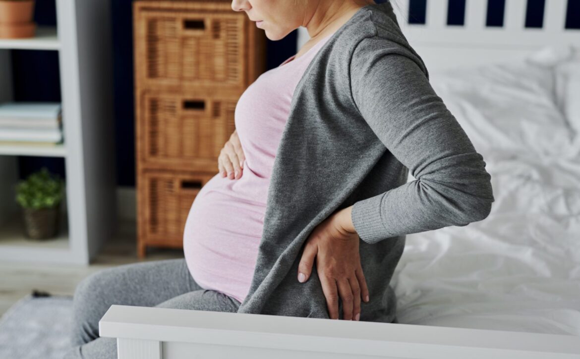 Pregnant woman feeling pain in the back